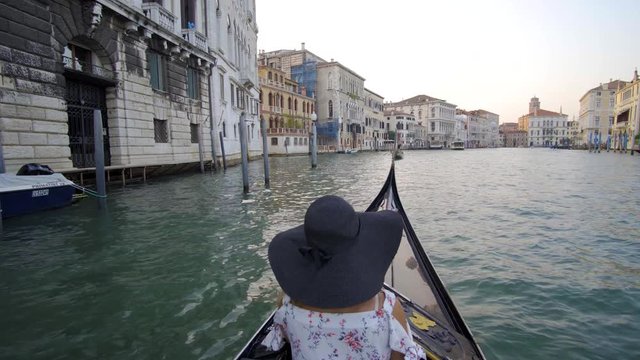 Young woman in gondola in Venice