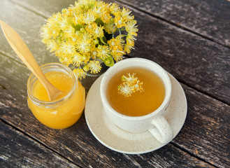 linden flowers herbal  Cup of healthy tea with honey. alternative or complementary medicine, traditional medicine. soft focus image 