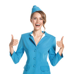 Portrait of charming stewardess wearing in blue uniform. Isolated on white background.