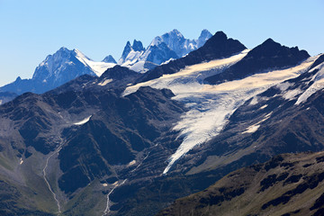 Top of Mount Kogutai with snow and glaciers in the North Caucasus.