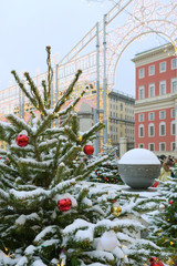 Christmas trees decorated with balls and garlands. Christmas and New year fair in Moscow, Russia