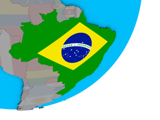 Brazil with national flag on blue political 3D globe.