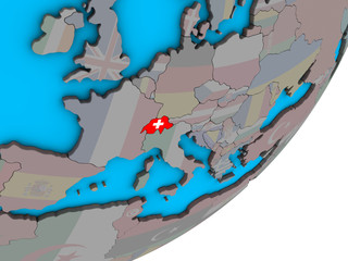 Switzerland with national flag on blue political 3D globe.