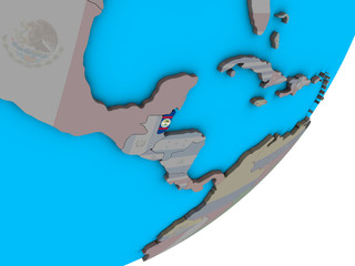 Belize with national flag on blue political 3D globe.