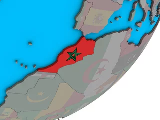Schilderijen op glas Morocco with national flag on blue political 3D globe. © harvepino