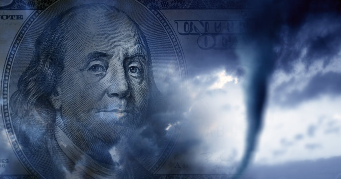 conceptual finance image of money, one hundred dollar bill, and stormy sky with approaching tornado