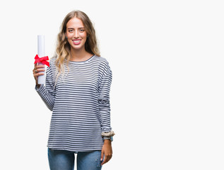 Beautiful young blonde woman holding degree certificate over isolated background with a happy face standing and smiling with a confident smile showing teeth