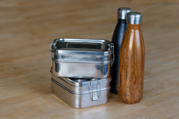 close up of two stainless steel zero waste lunch boxes