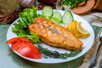Salmon steak on the grill