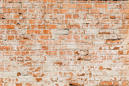 Very old red brick wall with white wash look on it