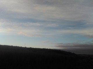 clouds and clouds over hills