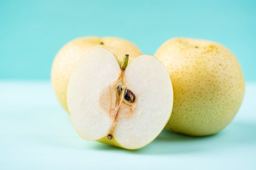 Fresh Asian pear fruit on color background