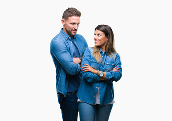 Young couple in love over isolated background happy face smiling with crossed arms looking at the camera. Positive person.
