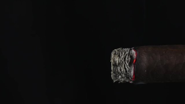 Handmade cigar and smoke