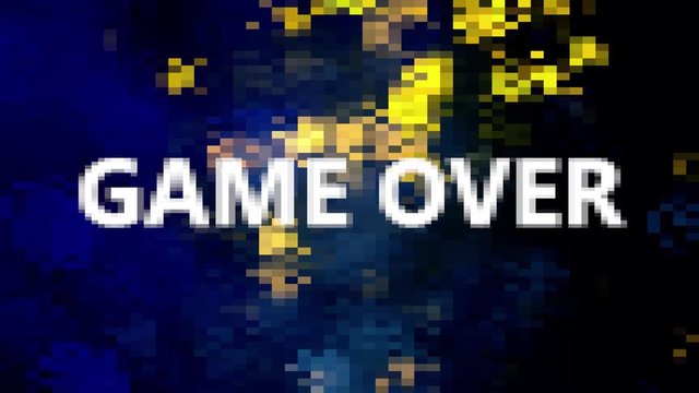 A videogame message screen, with the words Game Over, Try Again, Insert Coin, appearing with a dissolve effect. Background: falling sparkes, blue and yellow on black.
