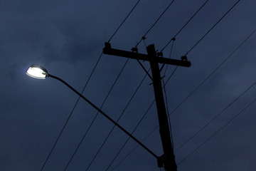 Light pole at night. This photograph was taken in Rio Claro, São Paulo, Brazil. October, 2018.