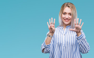 Young blonde woman over isolated background showing and pointing up with fingers number nine while...
