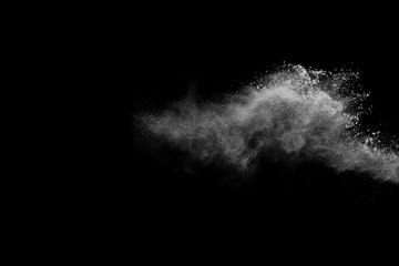 White powder isolated on black background.