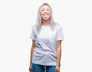 Young blonde woman over isolated background sticking tongue out happy with funny expression. Emotion concept.