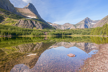 View of Mount Grinnell across Redrock Lake in the Many Glacier Area.Glaicer National Park.Montana.USA