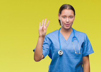 Young caucasian doctor woman wearing medical uniform over isolated background showing and pointing up with fingers number four while smiling confident and happy.