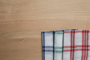 wooden table top with Kitchen ware for background