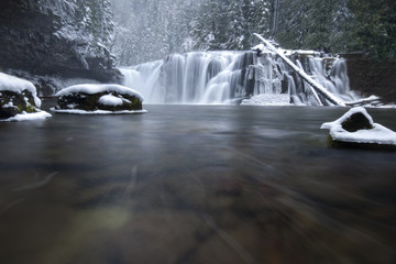 Fresh snow at Lower Lewis Falls in the Pacific Northwest