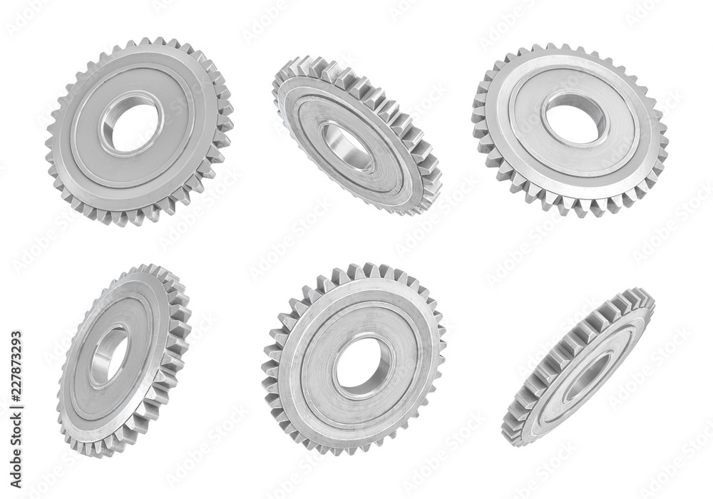 Poster 3d rendering of several metal spur gears hanging in different angles on a white background.