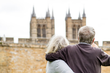 A elderly couple exploring in their retirement
