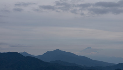Mountains, with Mt. Fuji hiding behind clouds just behind