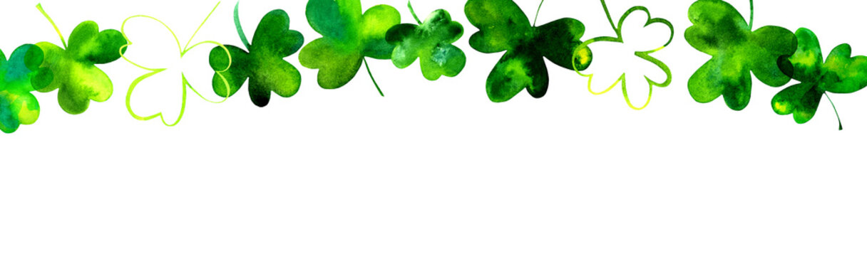 A banner with hand drawn watercolor shamrocks, Irish clovers, on a white background with copy space