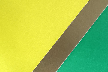 Background and texture of multicolored sheets of cardboard close up