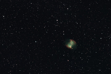 Fototapeta premium The Dumbbell Nebula in the constellation Vulpecula photographed from Mannheim in Germany.