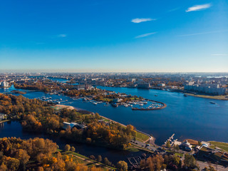 Saint-Petersburg. Gulf of Finland. Autumn urban landscape. Clear blue sky. Bridges. Residential area. Pleasure boats .