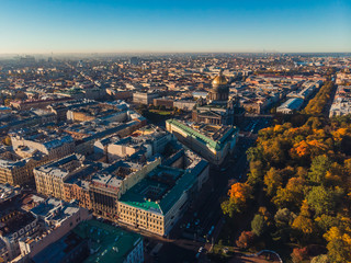 Fototapeta na wymiar Crossing Nevsky and Admiralty Avenue of St. Petersburg on Sunny autumn day top view aerial dron.