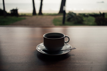 Relax scene of coffee cup on the floor in the morning.