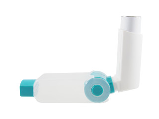 Asthma inhaler with spacer isolated on white background. Pharmaceutical product is used to treat...