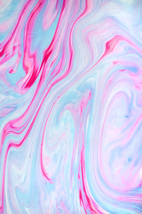 Abstract colored background. Stains of paint on the water. Ebru art, marbled paper.