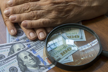 Hands Holding Money
