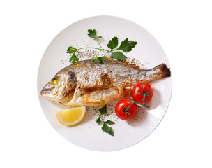 plate of baked fish on white background, top view