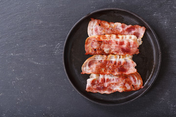 pan of fried bacon, top view