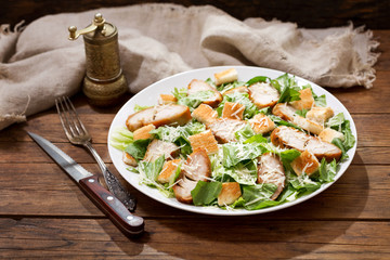 plate of chicken caesar salad