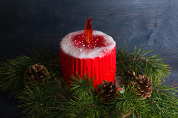 Christmas candle cake with caramel flame decorated with pine tree
