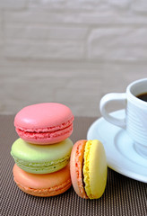 colorful macaroons and cup of coffee