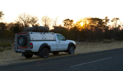 Fototapeta na wymiar Pickup truck driving in Botswana