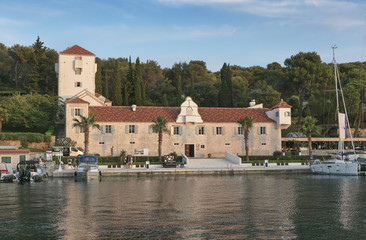 Fototapeta na wymiar Monastery - castle - hotel in Maslinica on island Solta, Dalmatia, Croatia