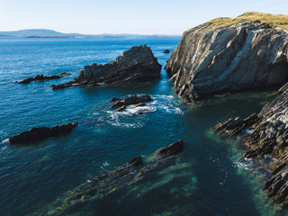 Fototapeta na wymiar Island cliffs in Ireland, Aerial view in summer