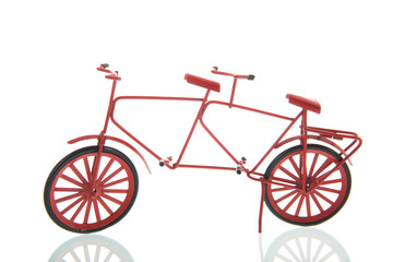 Miniature red double bike