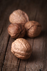 group of nuts on natural wood board