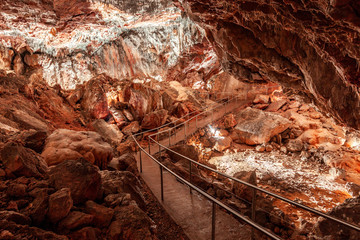 Footpath passing through beautiful limestone cave